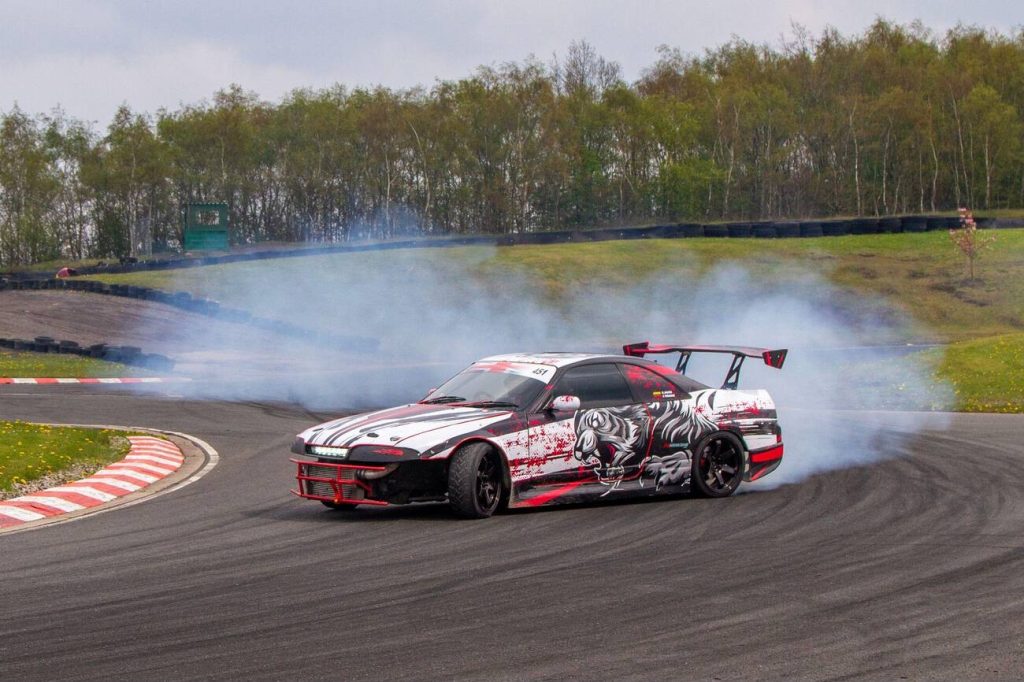Do race car drivers drive manual or automatic?